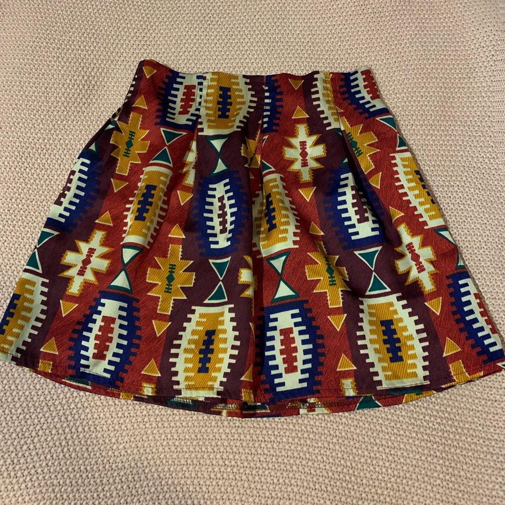 Pleated vibrant colored mini skirt